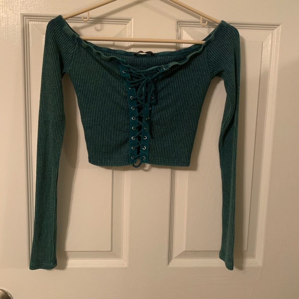 Green crop top wirh crosscross in front, worn once